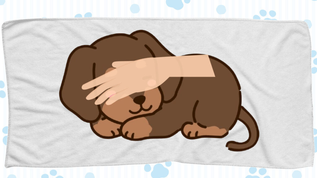 手のひらで撫でるようにしてまぶたを閉じる