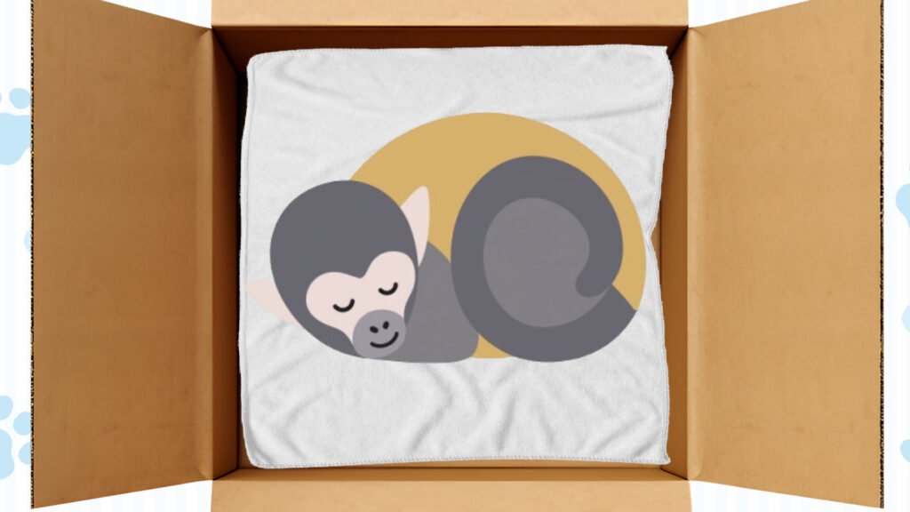 サルちゃんを棺の中に寝かせる